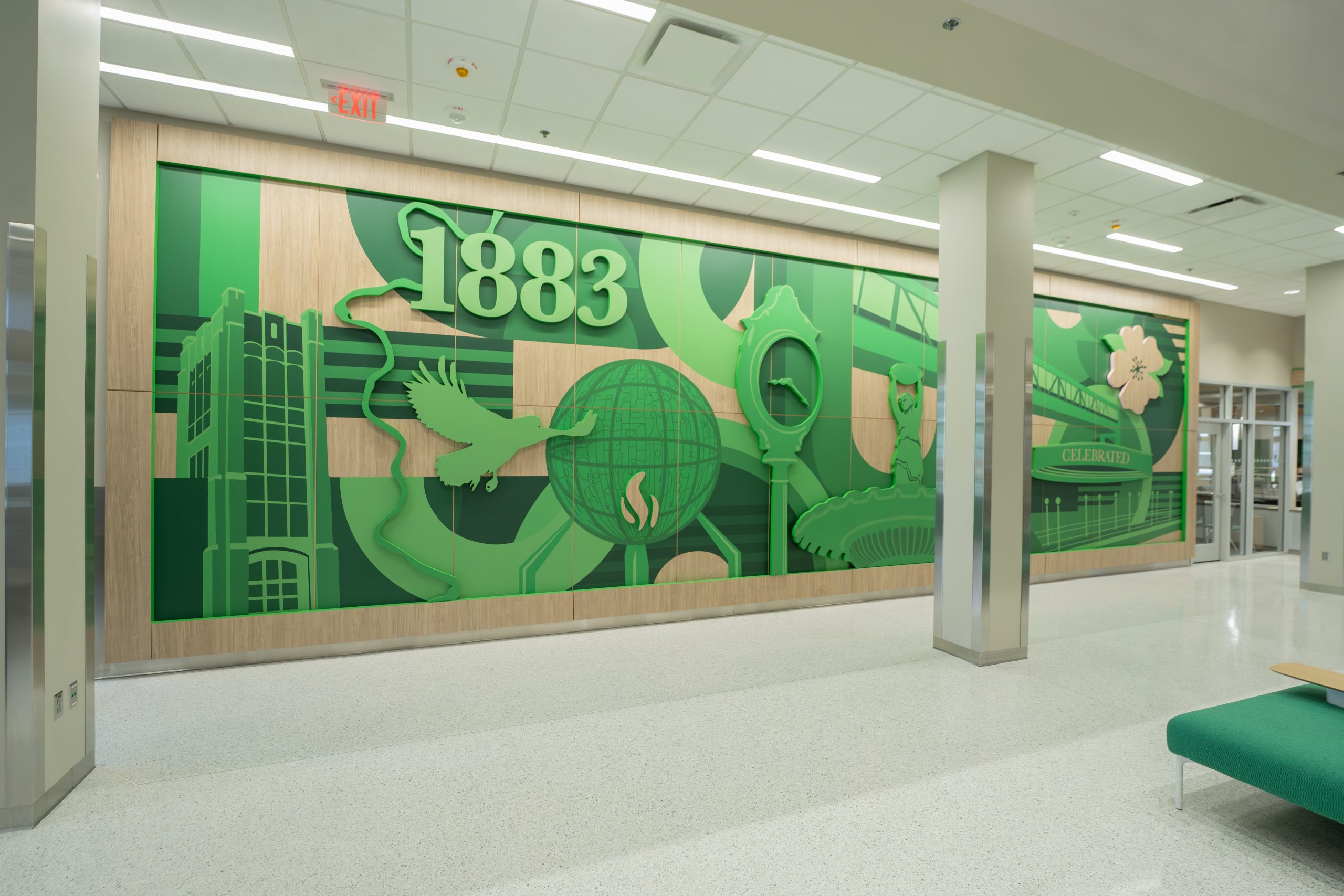 Familiar campus icons adorn the mural that welcomes visitors into the center.